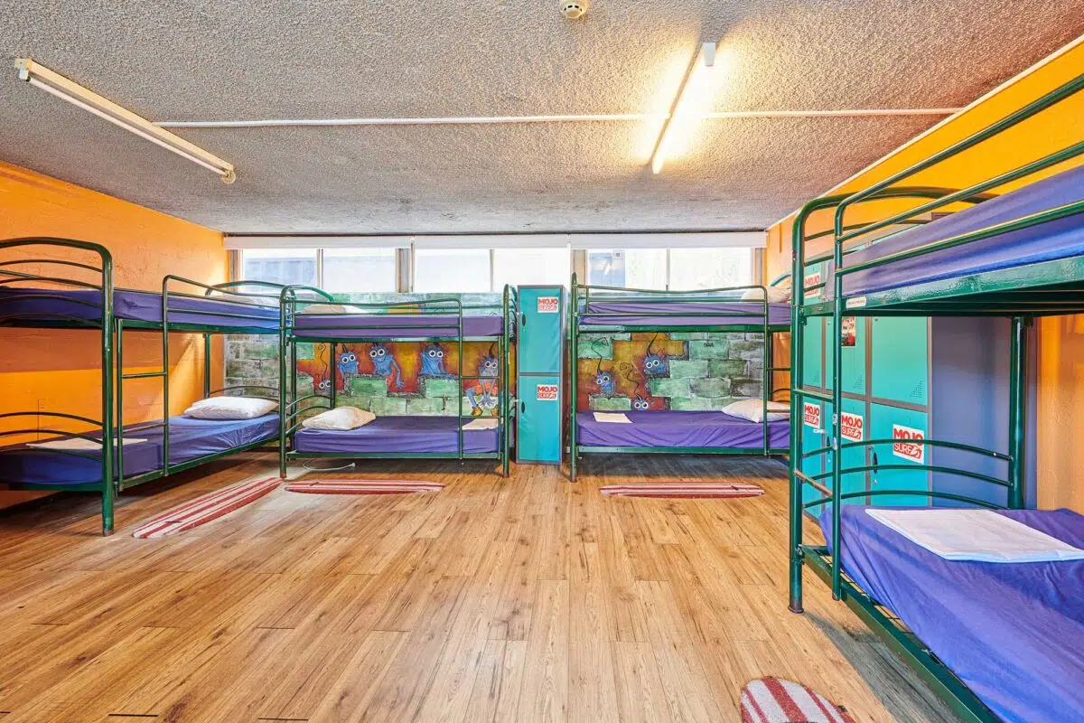 Bunk beds in a shared dorm at the Mojosurf camp in Byron Bay