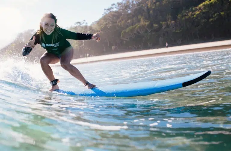 Surfer riding a softboard at Byron Bay