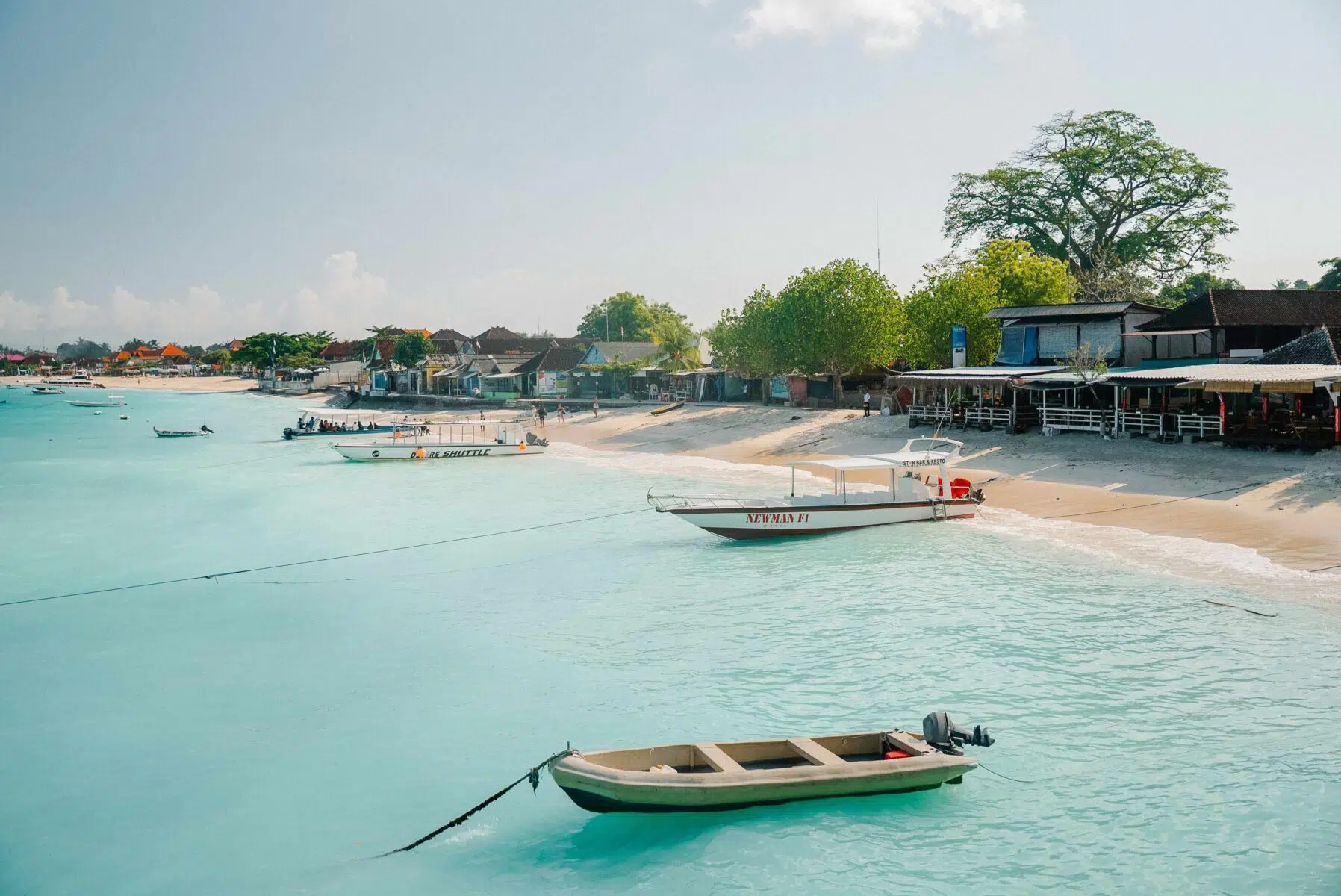 Boats moored off the beach at Nusa Lembongan