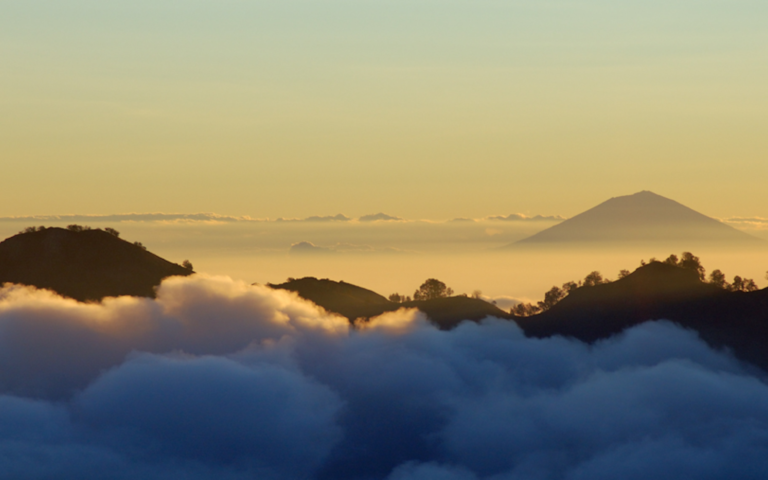 Sunrise above the clouds from a Bali volcano