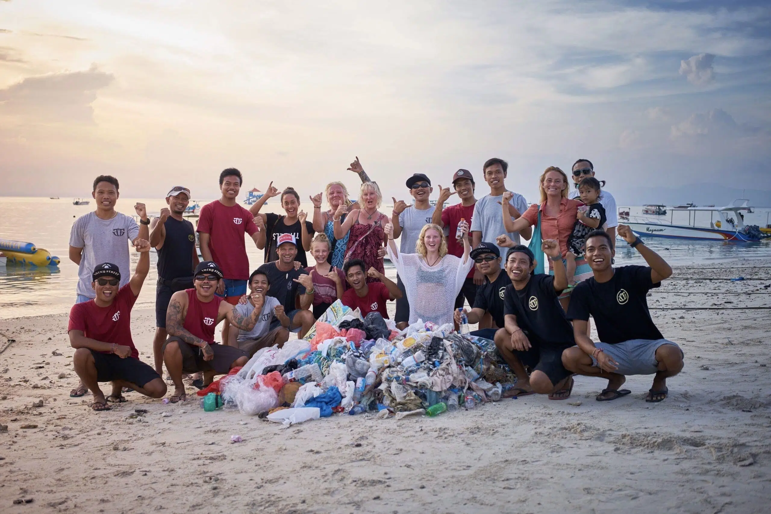 Group photo of guests on a beach clean-up