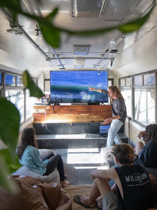 Surf theory class inside the Mojosurf bus