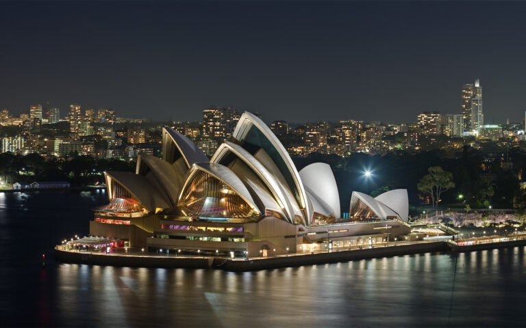Sydney Opera House lit up at night