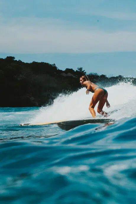 Surfer riding a wave at Nusa Lembongan
