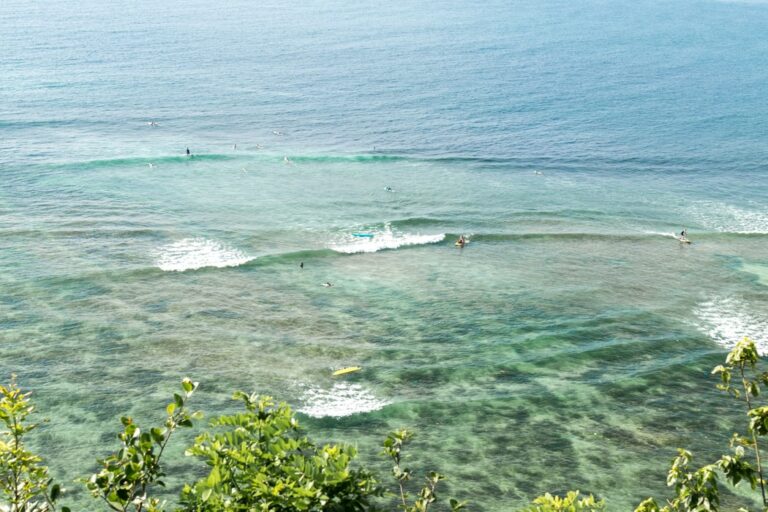 Turquoise waves breaking over a reef in Indonesia