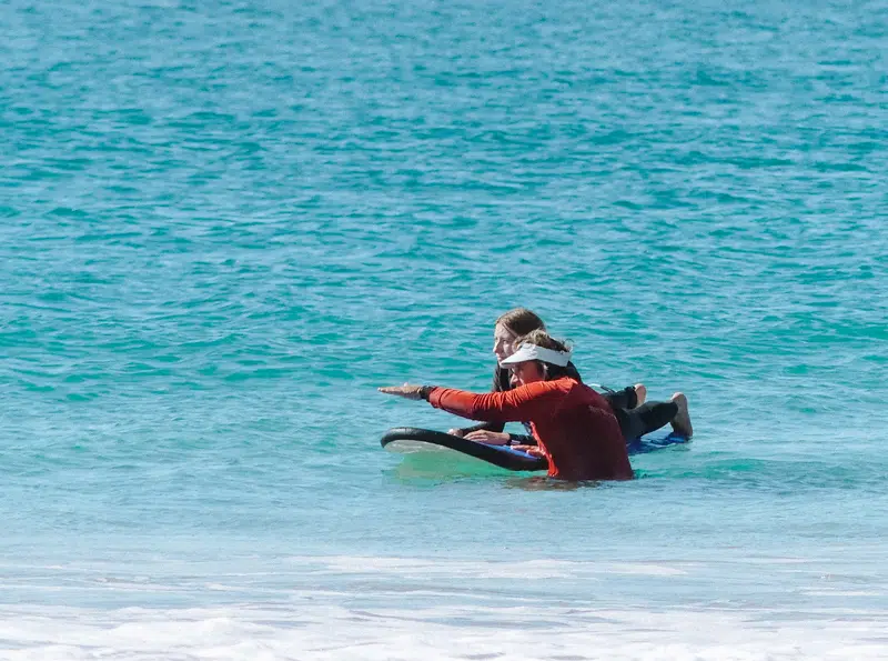 Learner surfer catching a wave