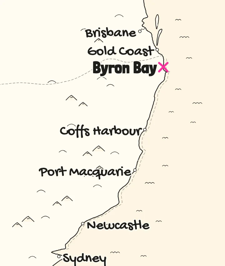 Map of the coast from Brisbane to Sydney with an X marking the Mojosurf Byron Bay surf camp, south of the Gold Coast
